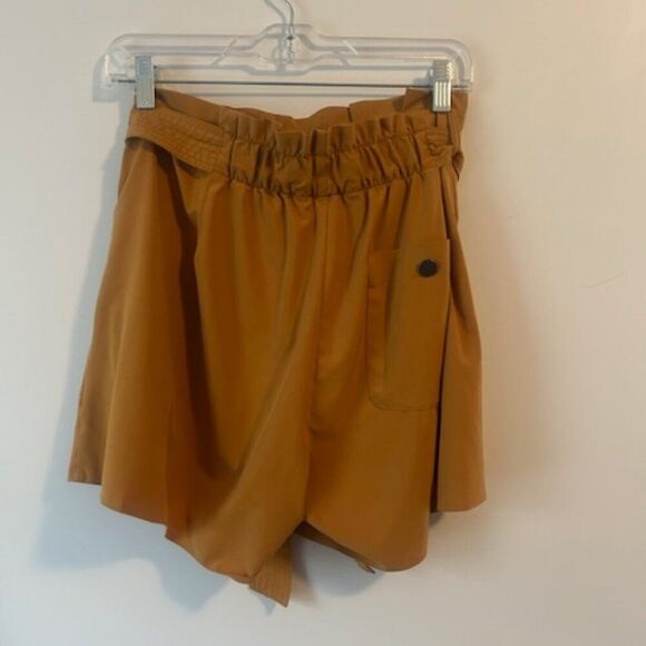 Athleta Gold Pleated front attached belt shorts, size 12 - Picture 2 of 4